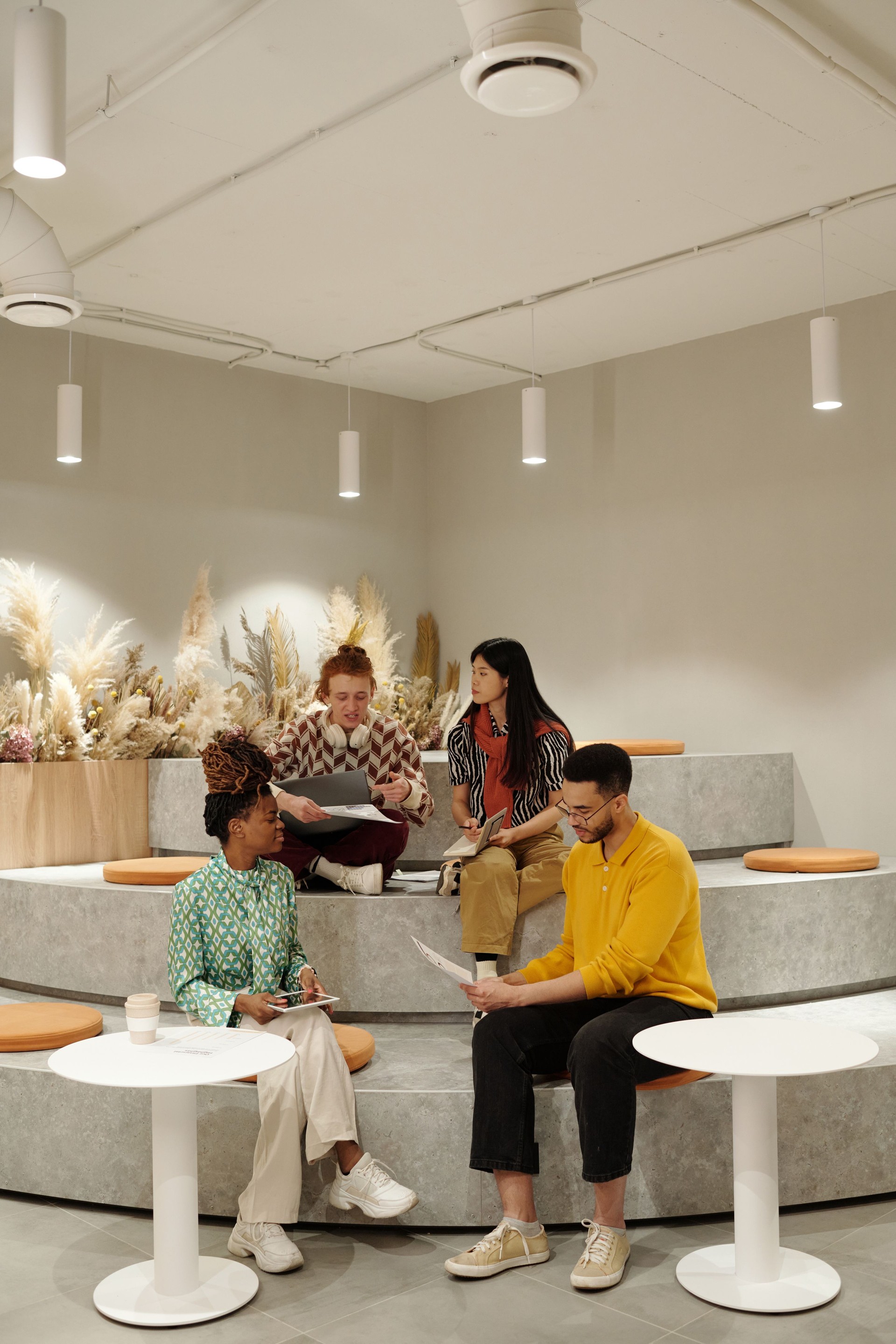 Brainstorming Ideas Young Adults of Diverse Ethnicity in Creative Coworking